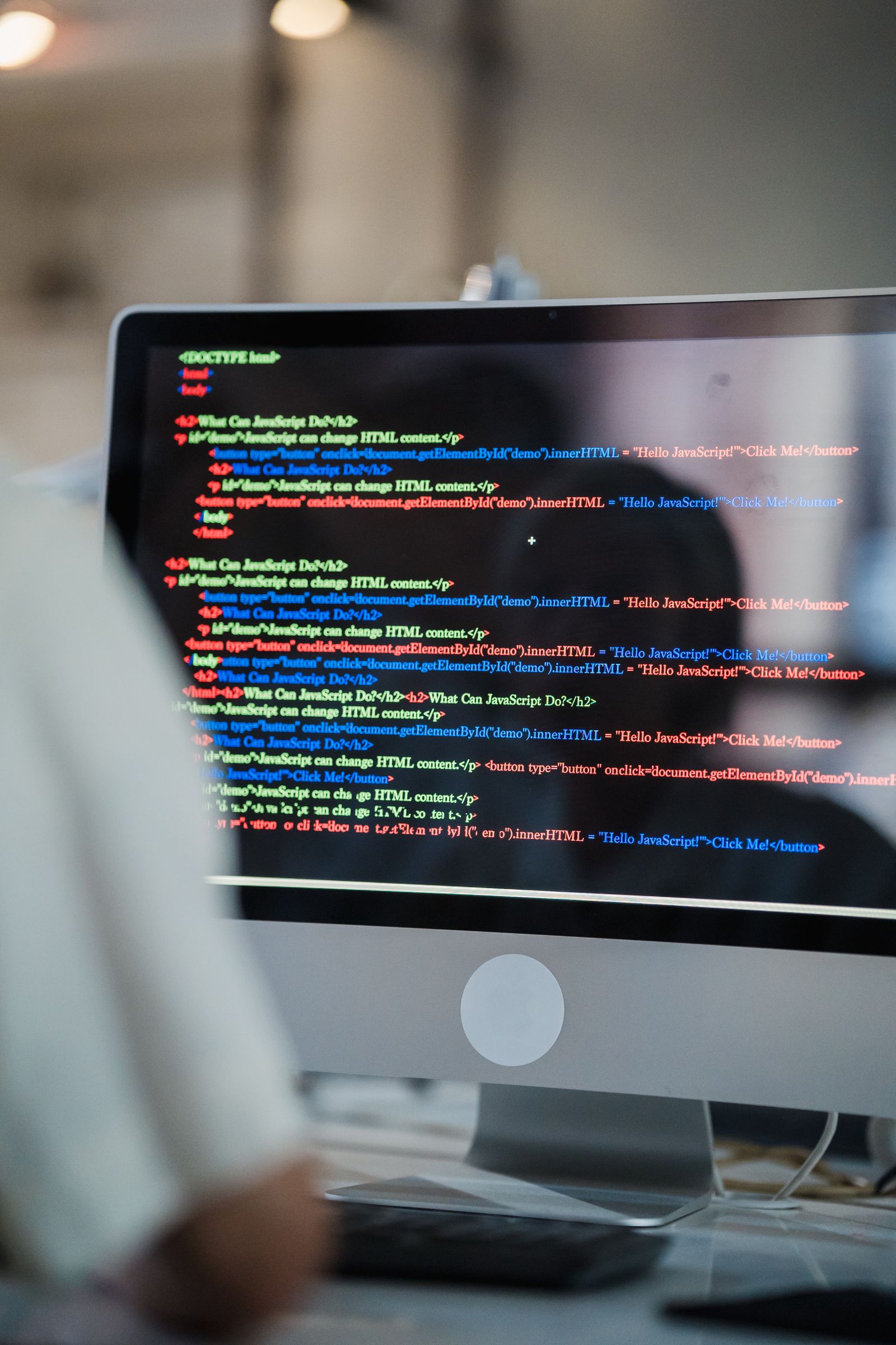 Computer screen displaying colourful programming code