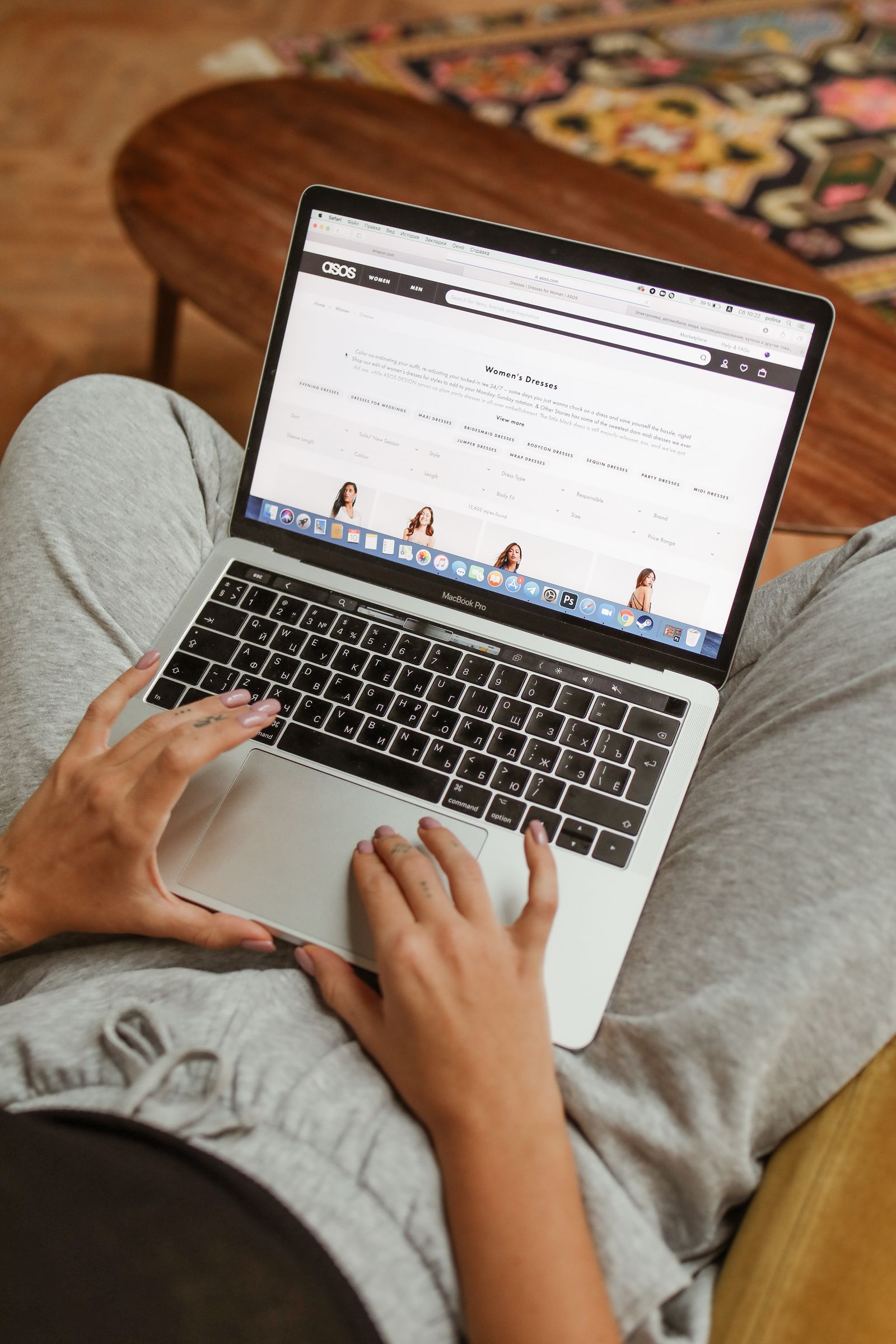 Person browsing an online shop on a laptop